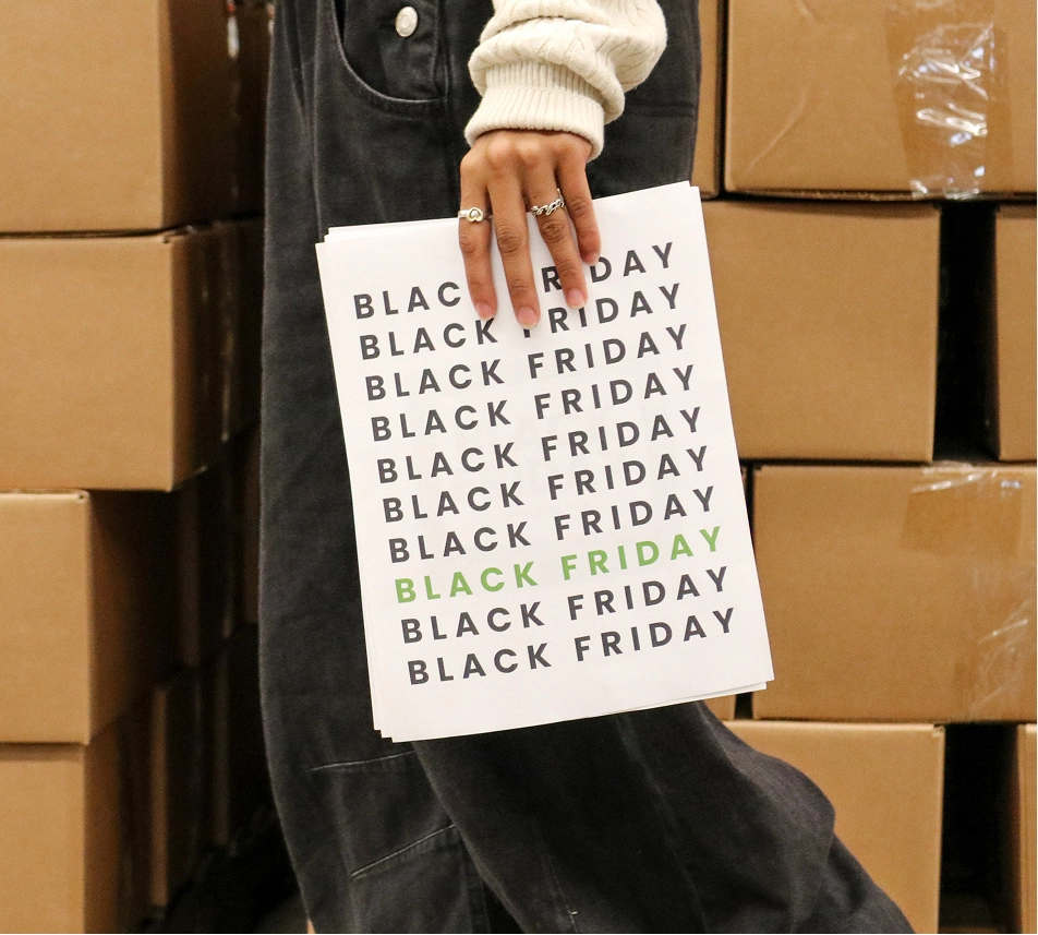 Truly Free Laundry Wash and refill pouch in a laundry room, with a woman and baby in the background.