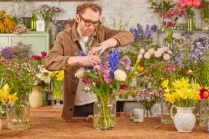 Freddie arranging the King's coronation flower arrangement