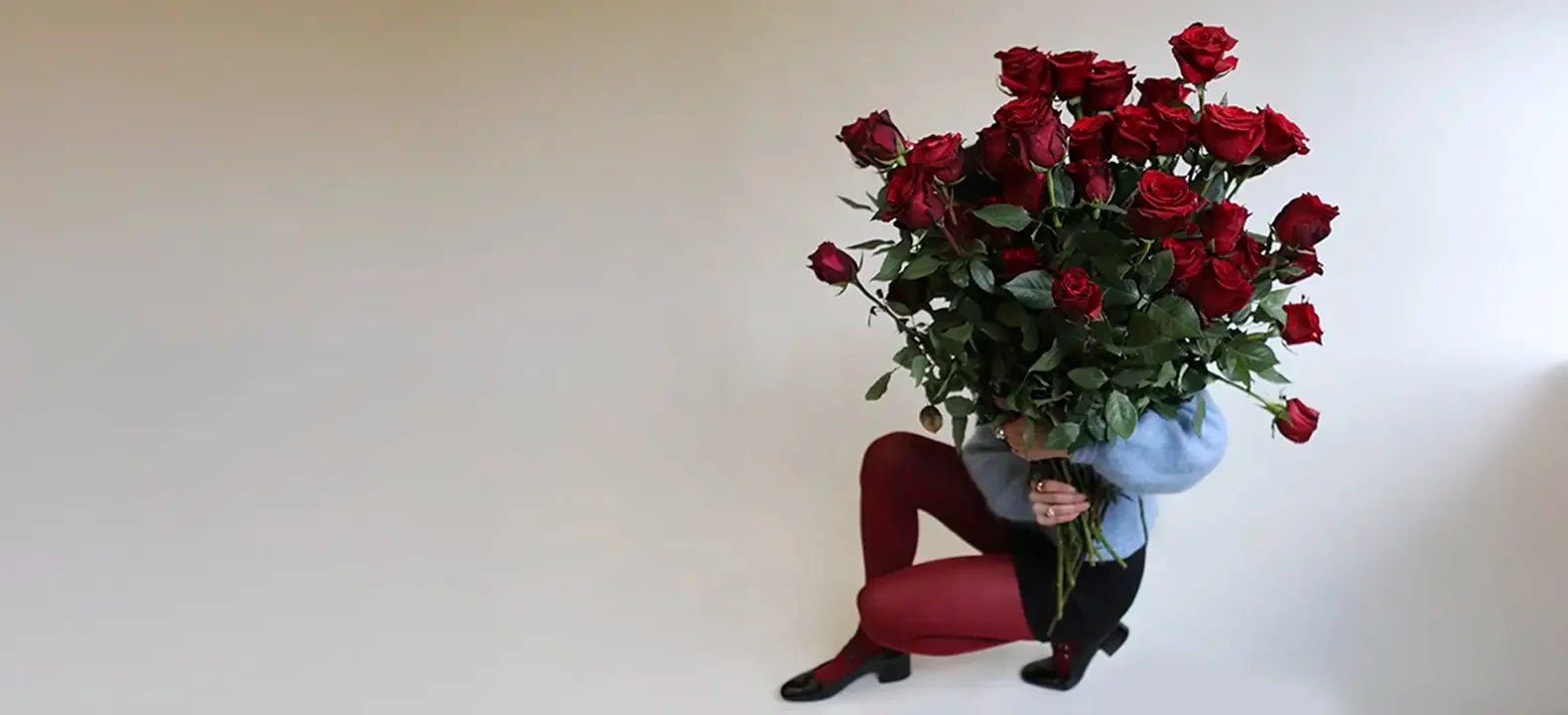 Why are red roses the ultimate symbol of love?