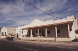 Evolution of Four Peaks Brewing Co.'s neighborhood from agricultural creamery to a modern hub. Railway abandonment, changing ownership, and eventual adaptation of the creamery space. A resilient history of surviving multiple tenants until Four Peaks Brewing Co. opened in 1996.