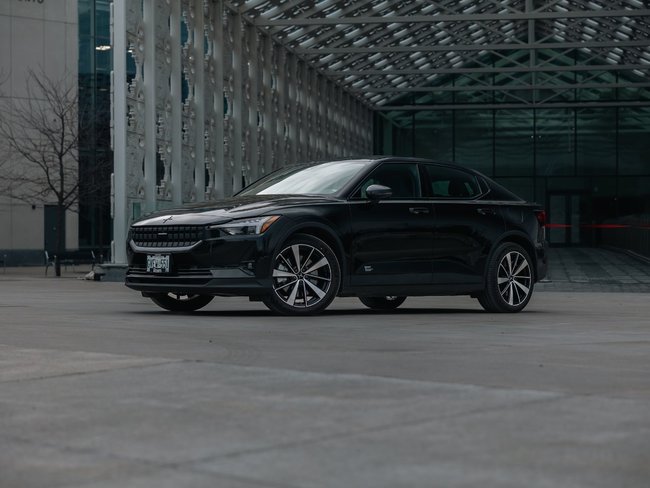 Roam Polestar 2 in front of building