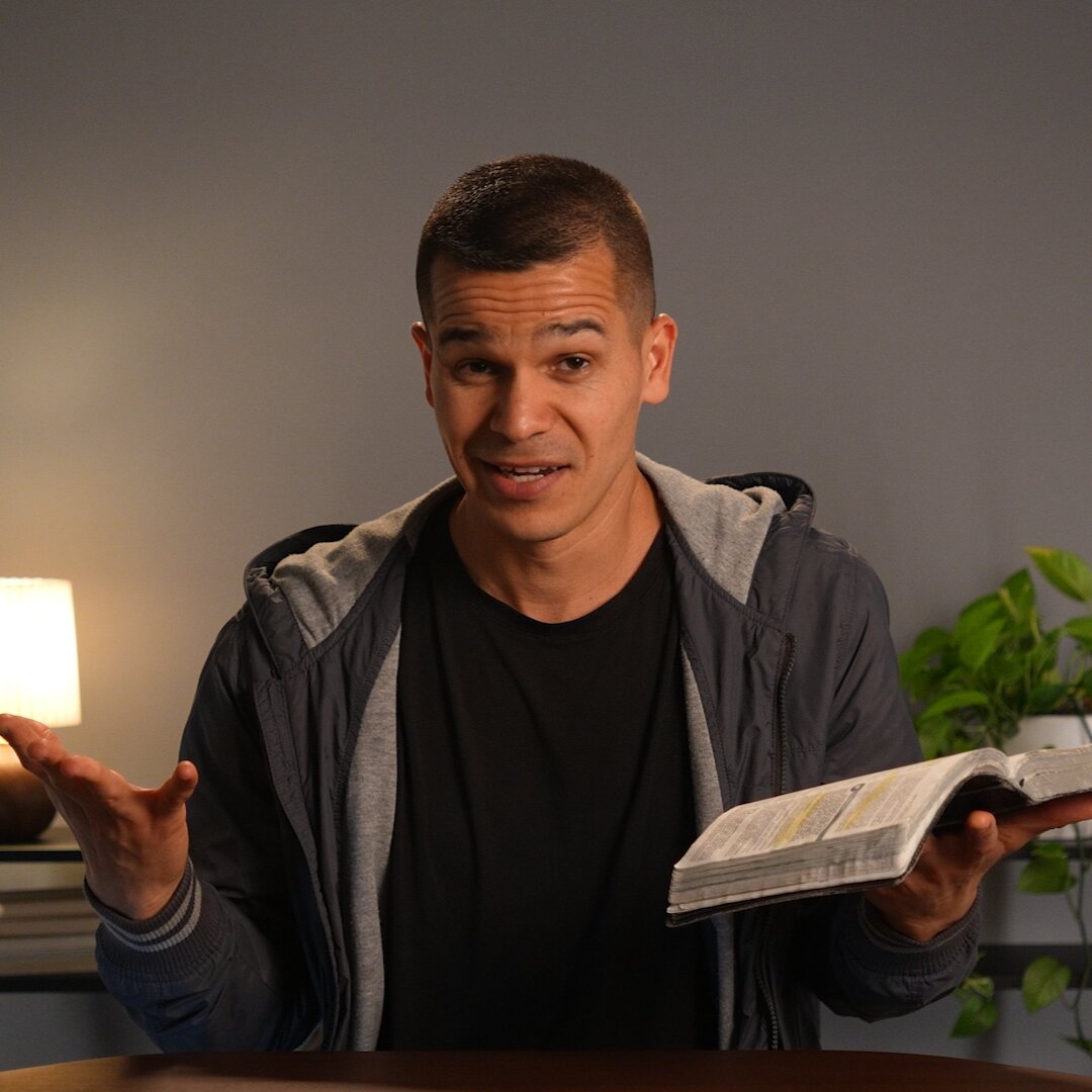 Pastor Val holding a Bible