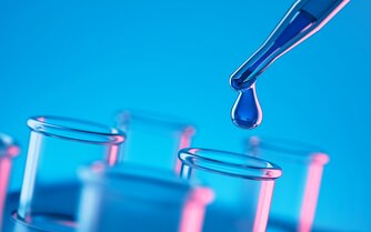 Image depicting a pipette dispensing liquid into test tubes, symbolizing the use of supplementary enzymes in molecular biology research.