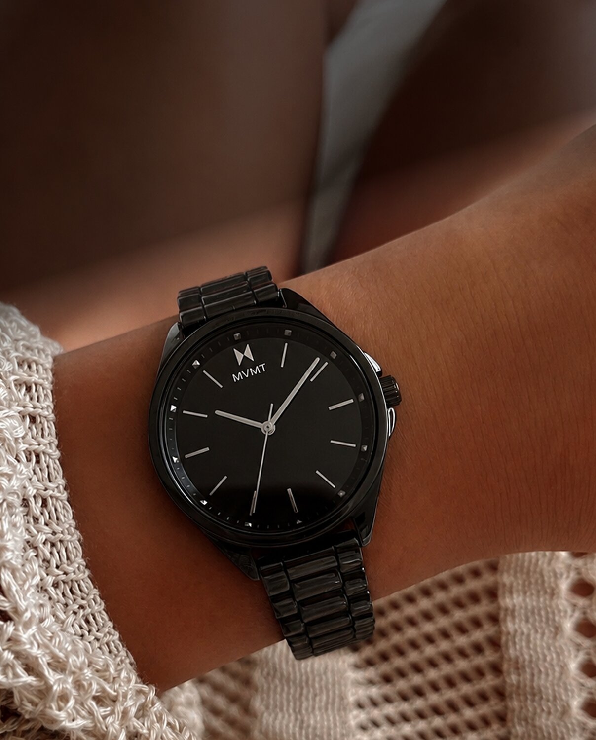 MVMT Coronada black ceramic watch on model 