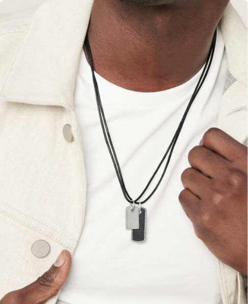 Movado micro tag necklaces on model