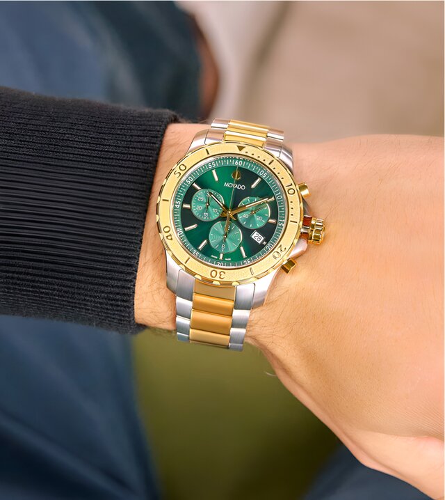 Movado Active Sport two tone bracelet with green dial on model