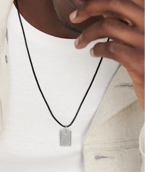 Movado micro tag necklaces on model