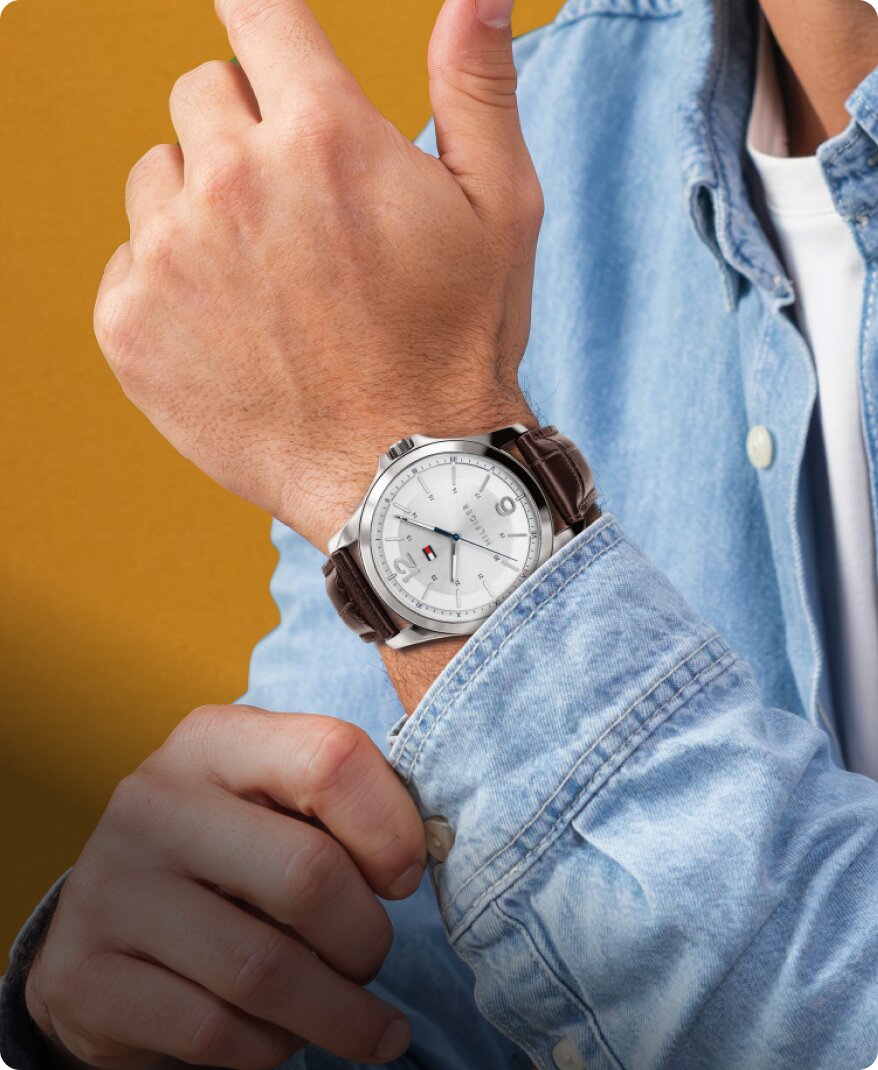 Tommy Hilfiger mens brown strap watch on model