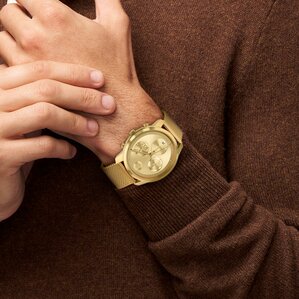 Movado Trend thin gold ionic plated stainless steel mesh bracelet and gold dial watch on model 