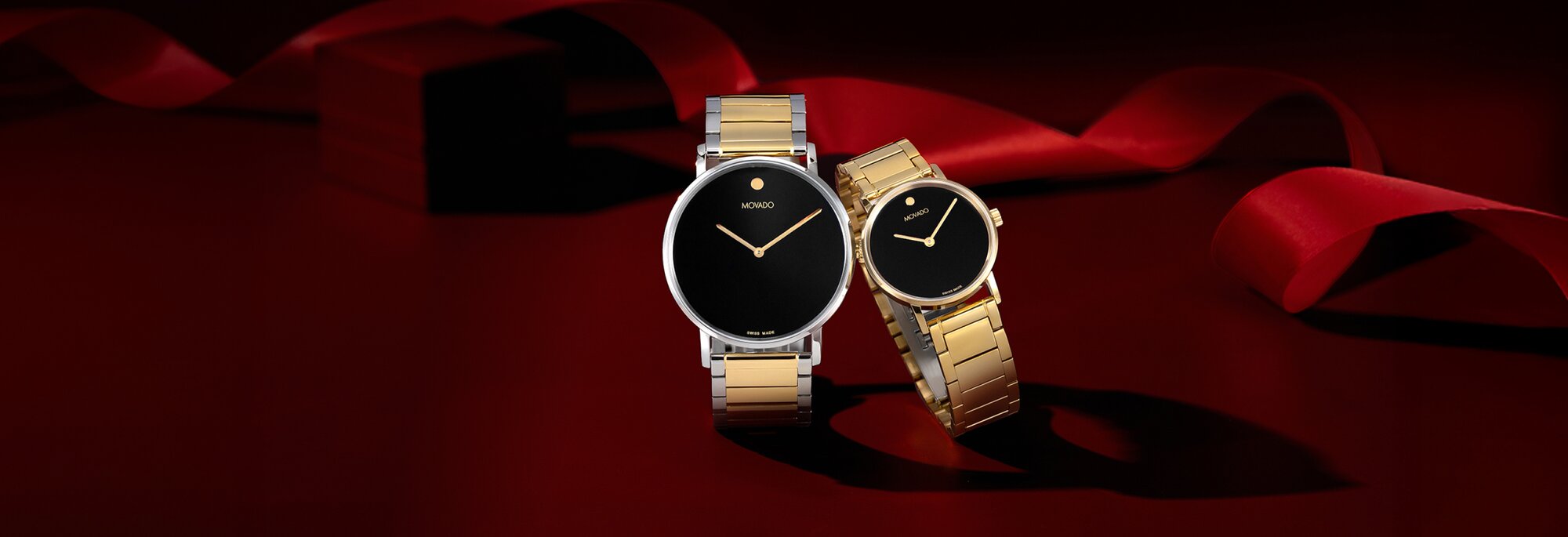 Movado Signature his and her watches in mens two tone and womens gold plated bracelet