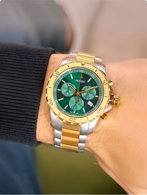 Movado Active Sport two tone bracelet with green dial on model