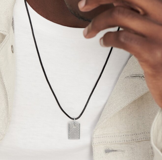 Movado micro tag necklaces on model