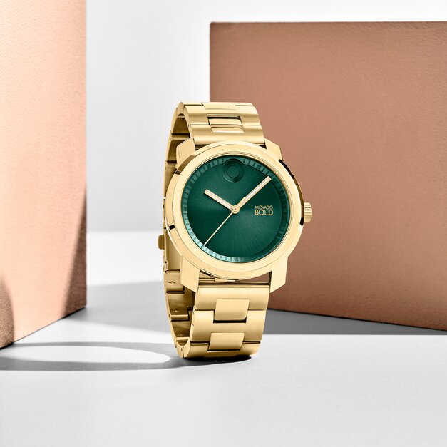 Movado Trend thin gold ionic plated stainless steel mesh bracelet and gold dial watch on model 