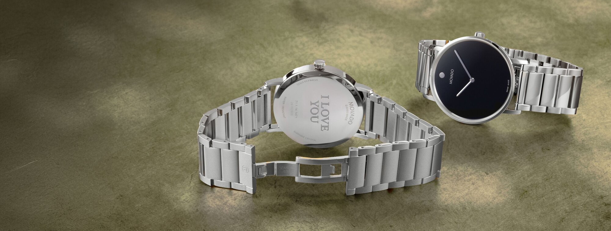 Movado signature stainless steel bracelet with engraving on caseback