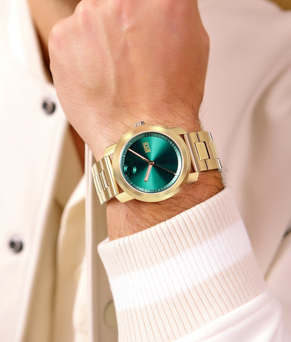 Model wearing movado trend propel watch with green dial on sale for $369