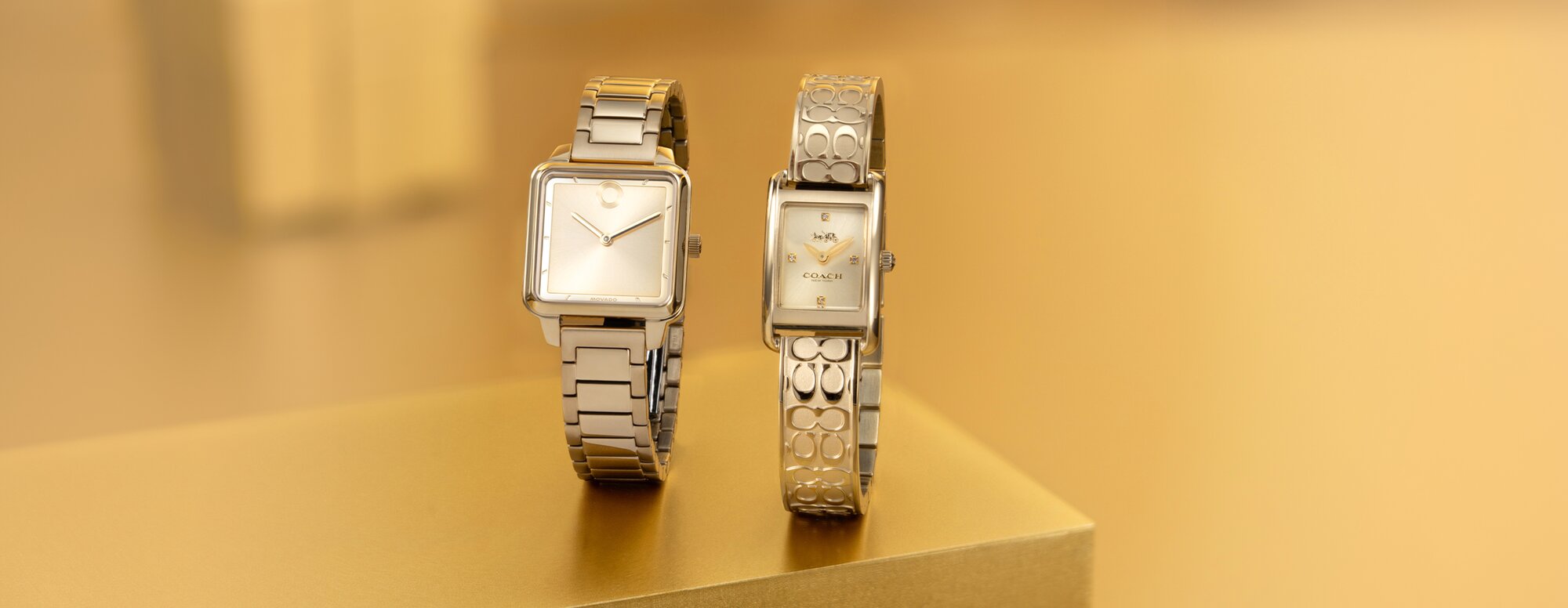 Movado and Coach gold watches