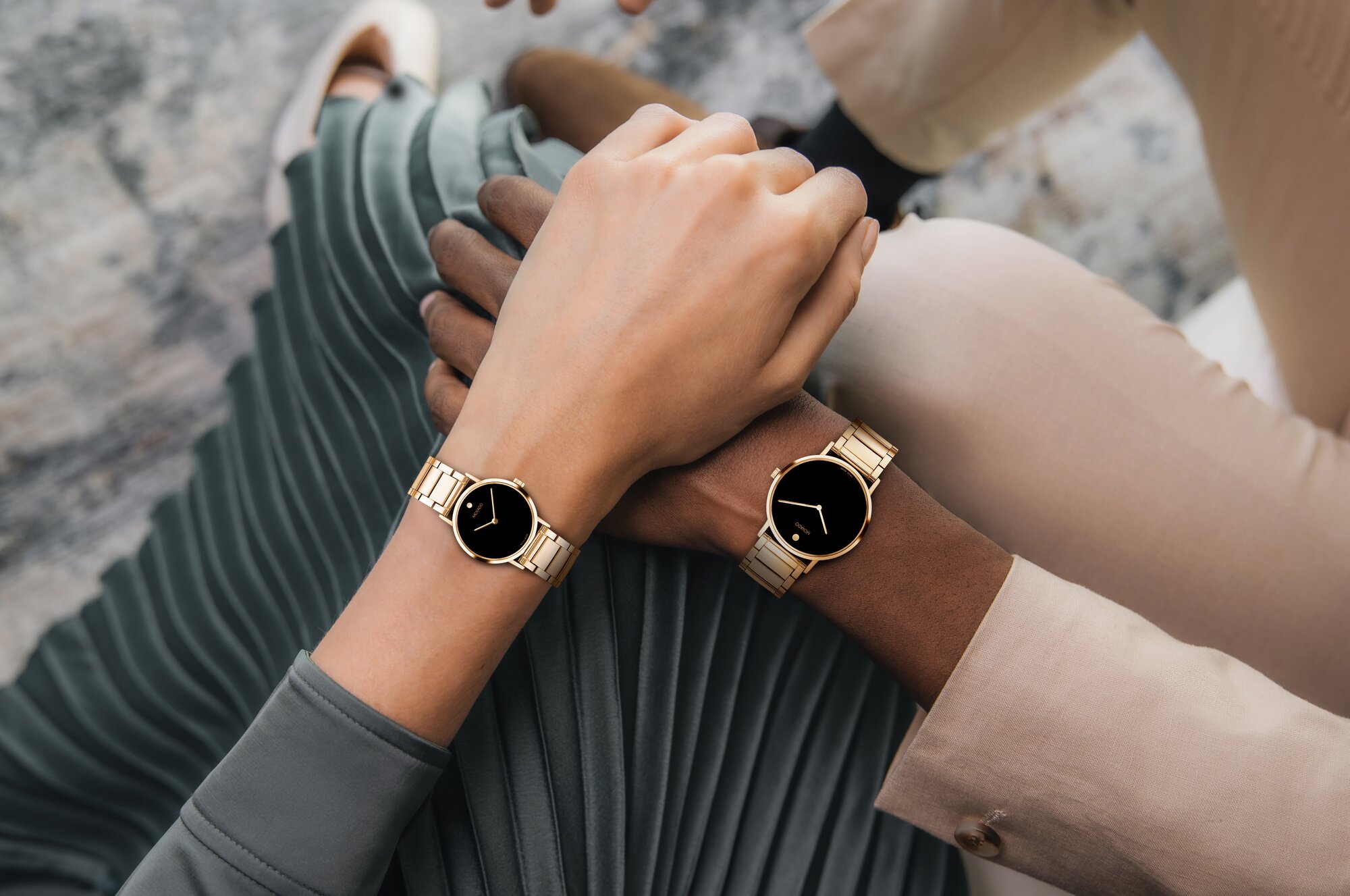 Movado Signature gold plated bracelet and black dial his and her set on model 