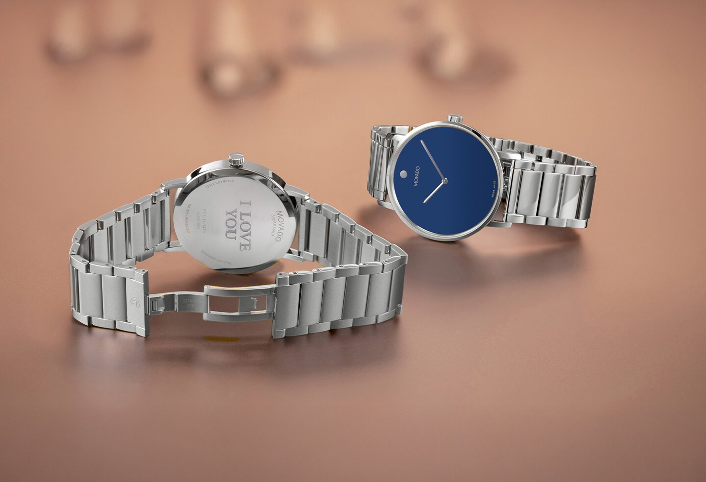 Movado Signature stainless steel bracelet with engraving on caseback