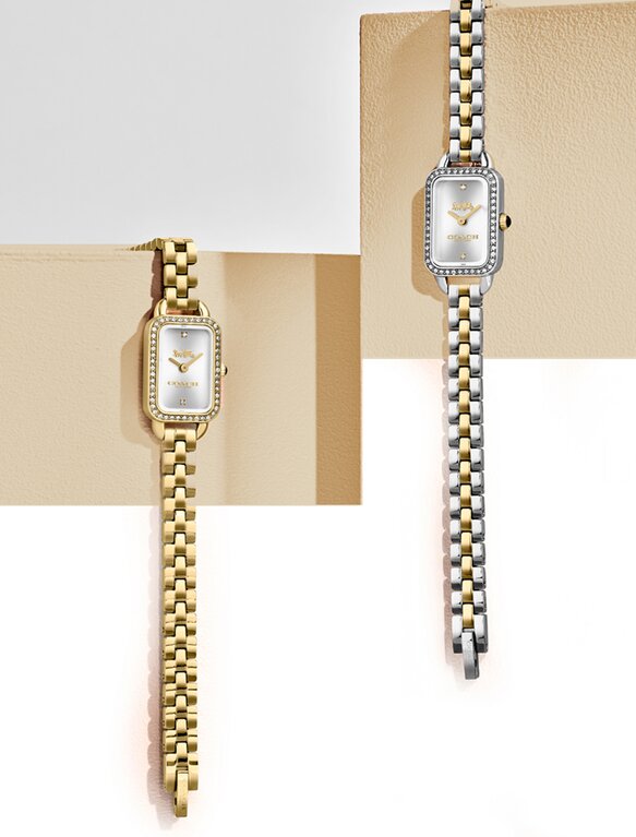 Coach Ludlow petite rectangle shaped dial in gold and two tone bracelets