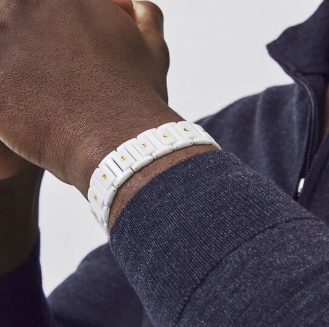 Movado SE white ceramic mens bracelet on model