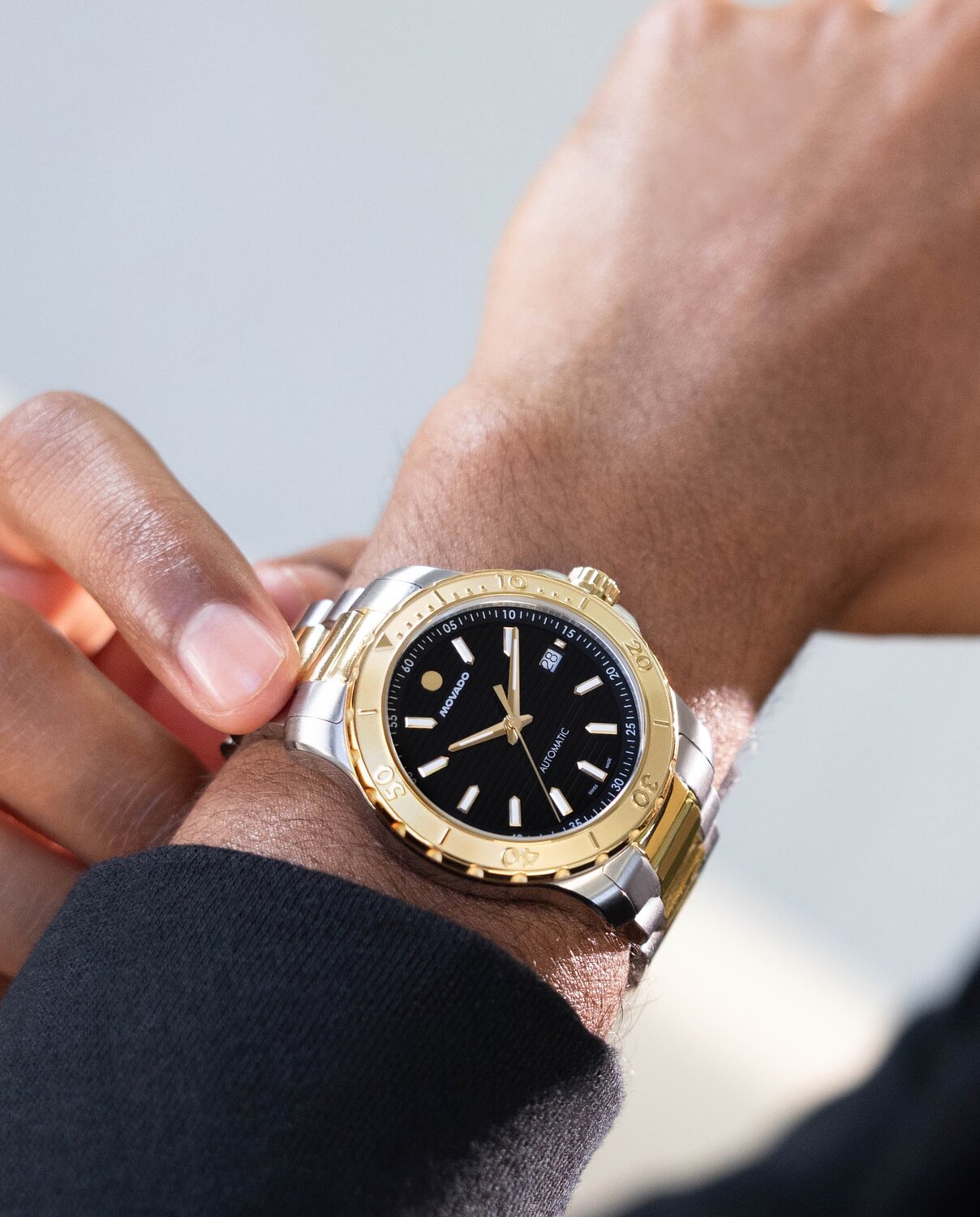 Movado two tone active sport watch on model