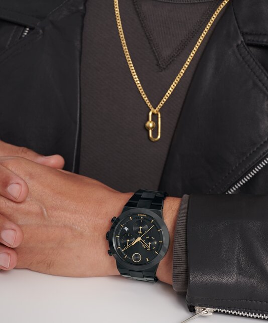 Movado micro tag necklaces on model