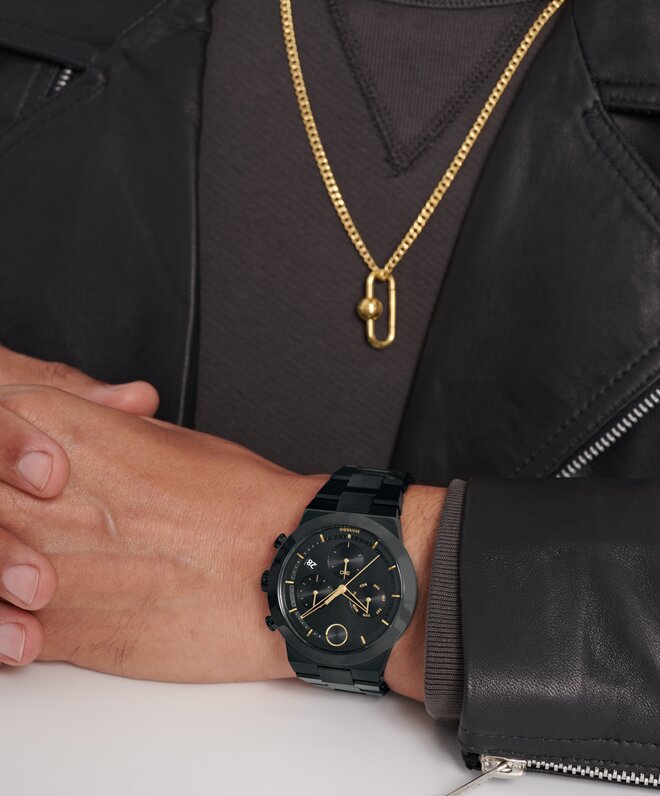 Movado micro tag necklaces on model