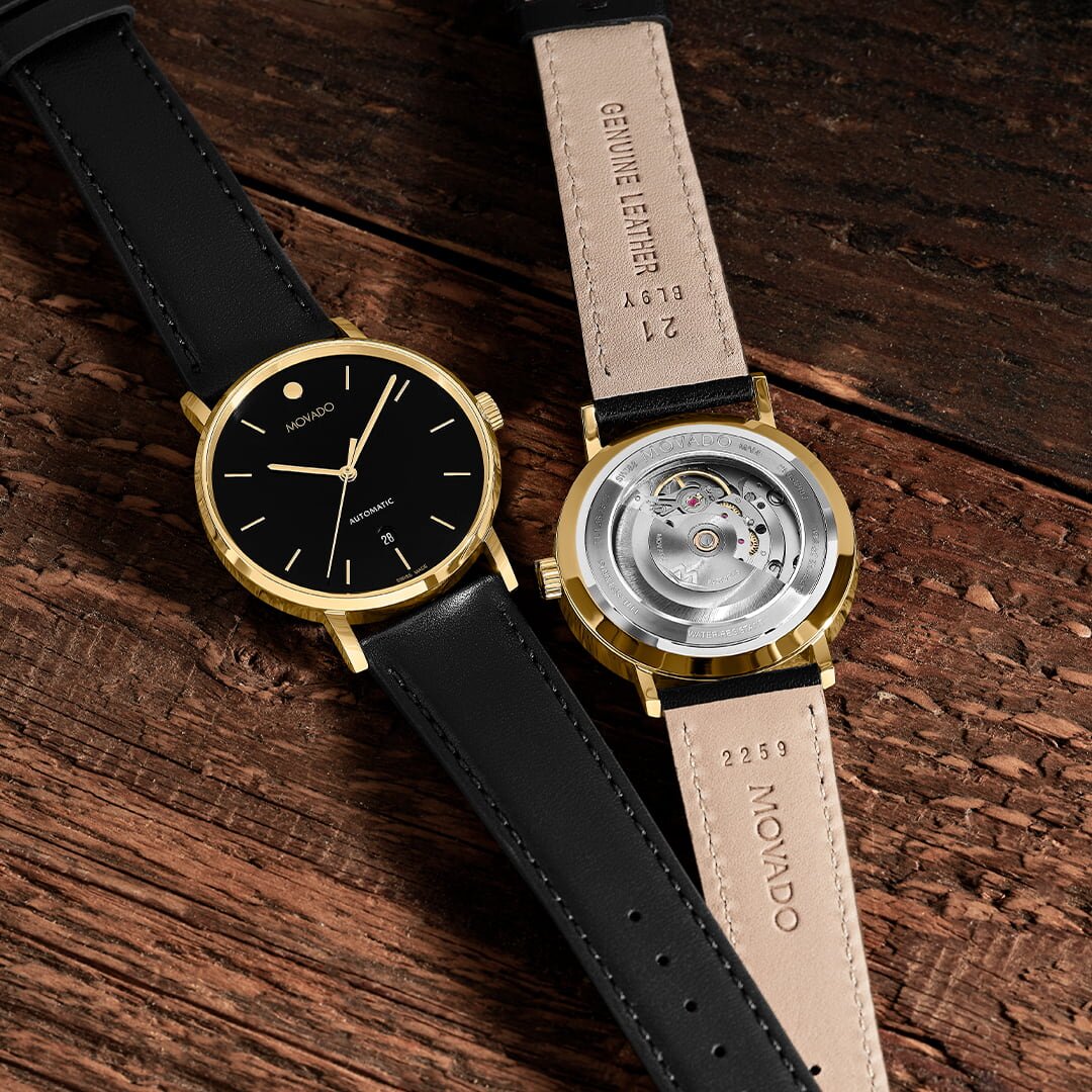 Movado Signature automatic watch on model with black strap, silver case and black dial 