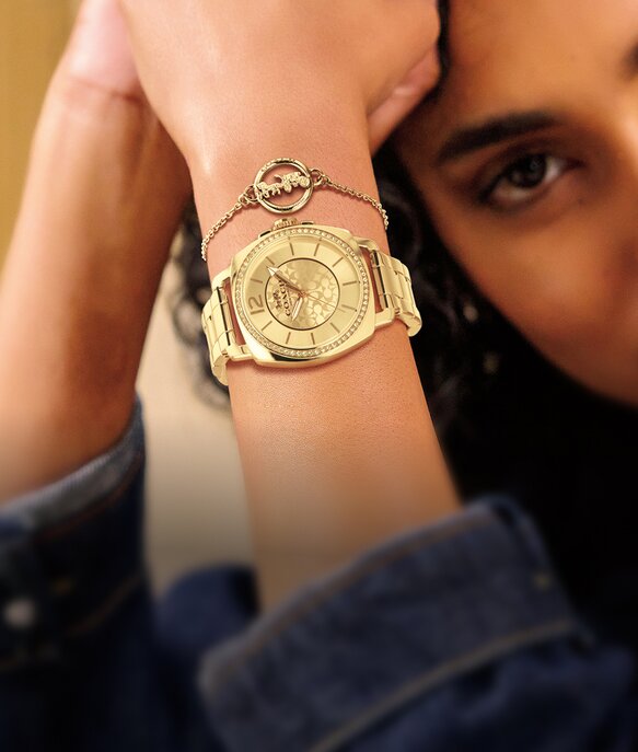 Coach boyfriend watch and bracelet gift set on model
