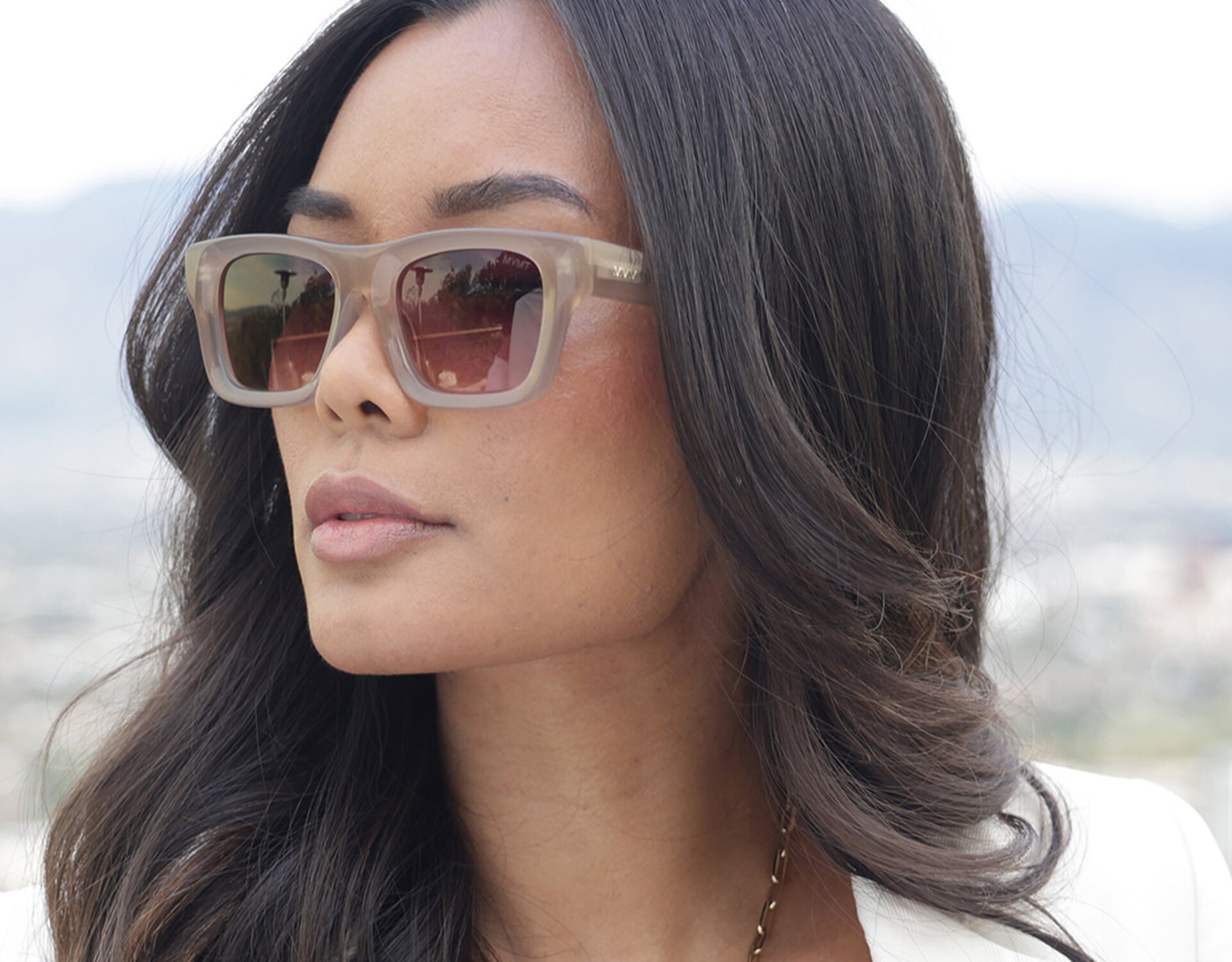 Model wearing MVMT trap sunglasses