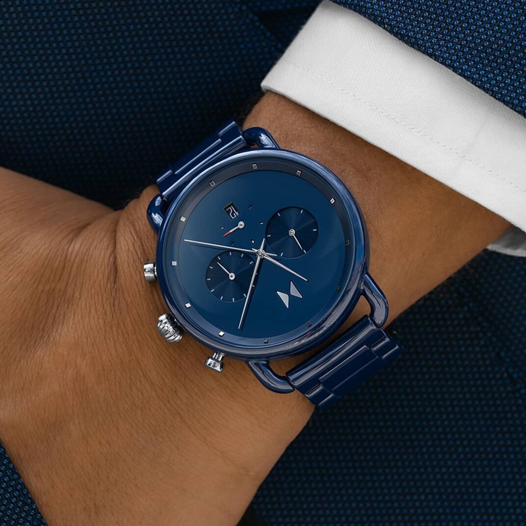 Picture of MVMT blue ceramic blacktop watch on figure