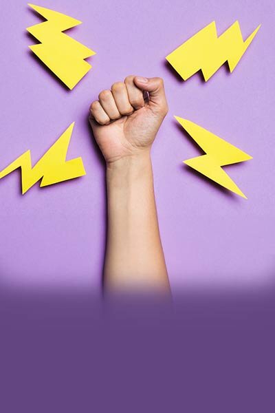 A fist with lightening to show commitment