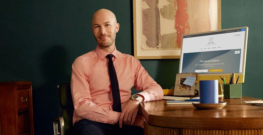 Clinician in front of computer