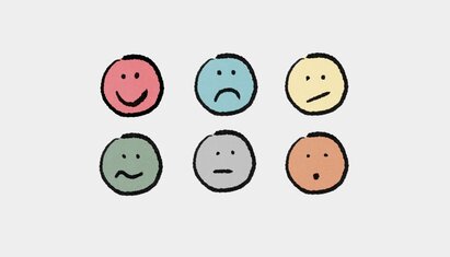 illustration of different emotion faces to show a feelings wheel for adults