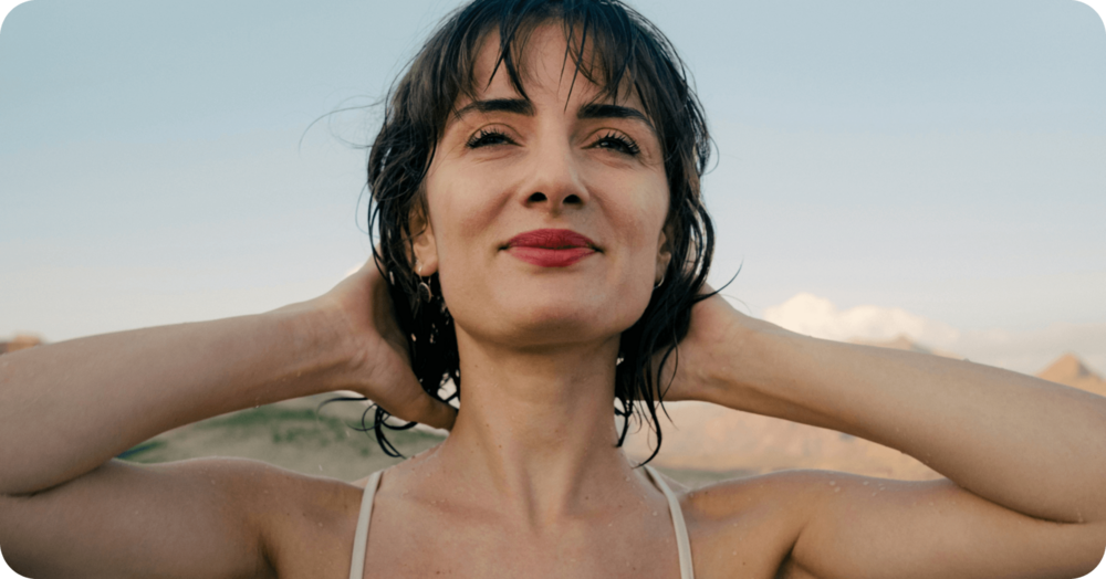 confident woman after using a strengths worksheet