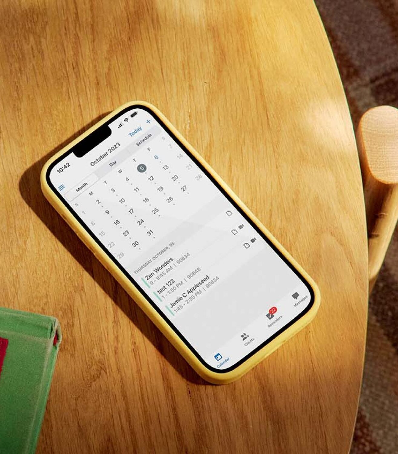 Mobile phone with calendar on desk