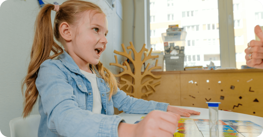 A school aged child is about to take the CASL-2 assessment with her SLP.