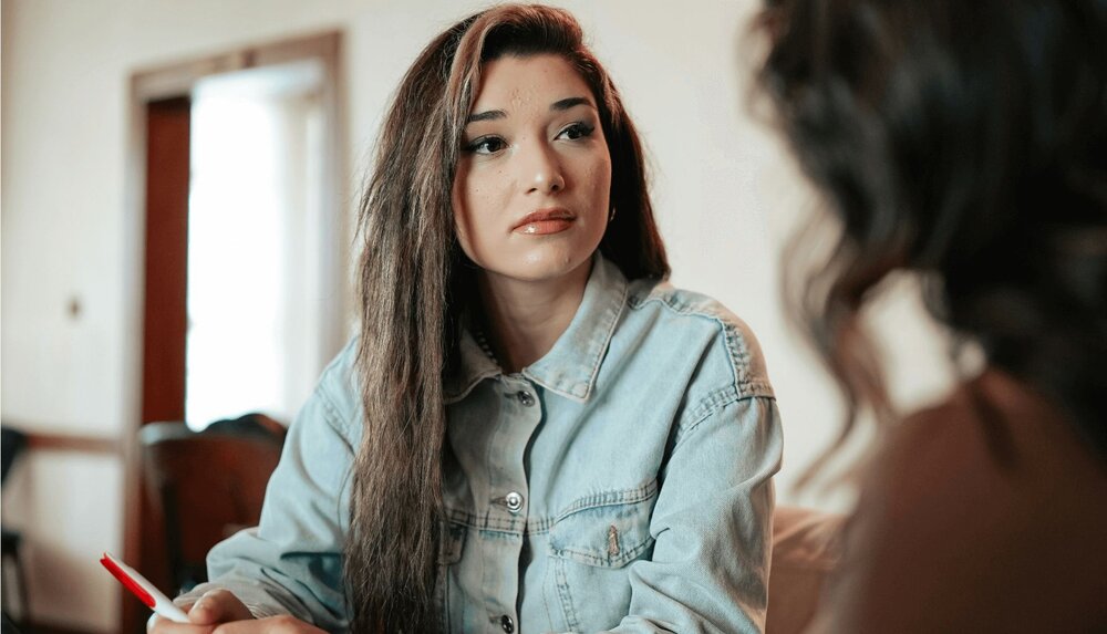 person using reflective listening worksheet skills while having conversation