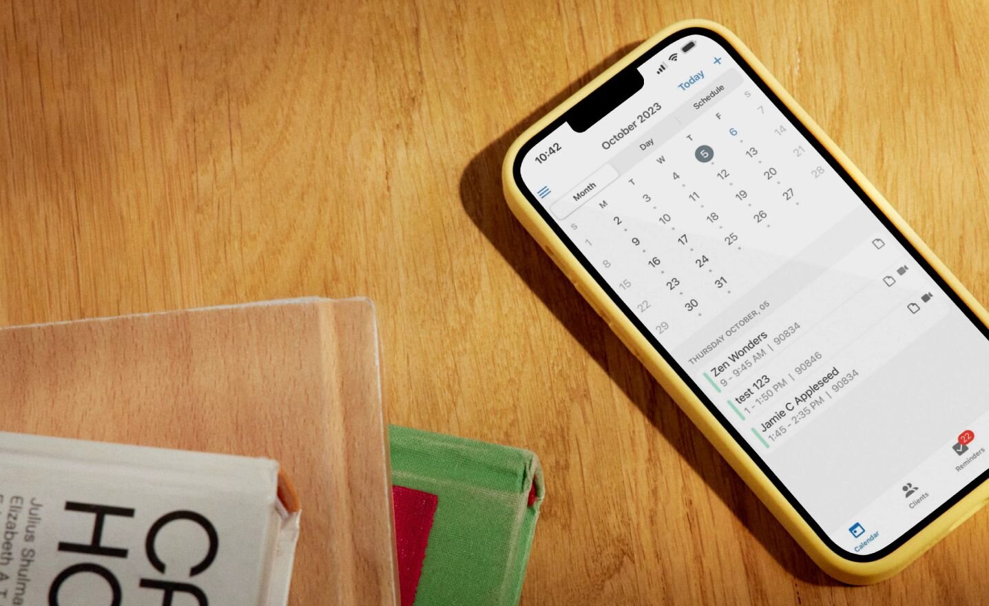 Mobile phone with calendar on desk