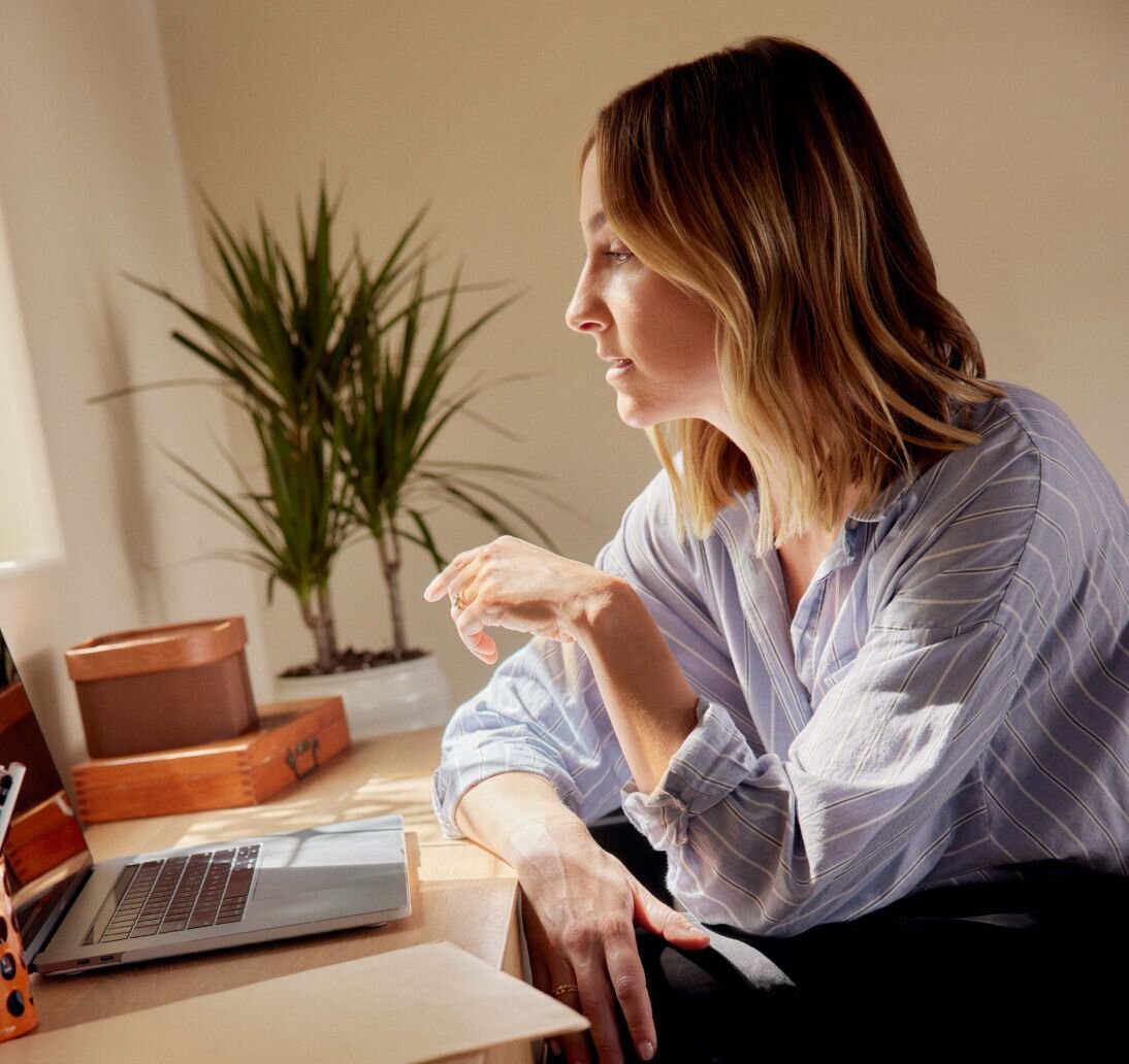 Psychiatrist working on laptop computer