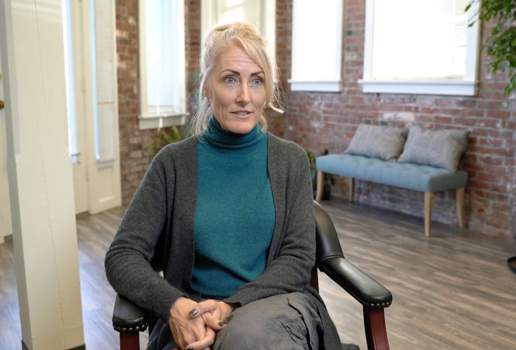 Dr. Lisa Hardebeck sitting in chair