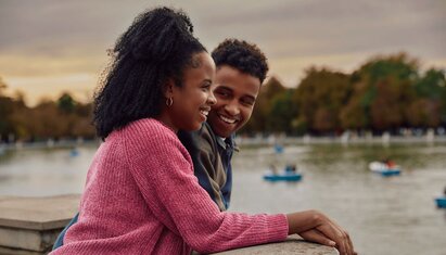 couple smiling on a date using examples from bonding rituals for couples worksheet