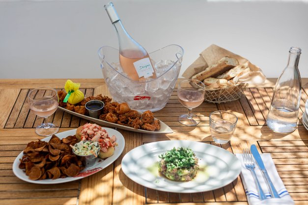 Duryea's Private Label Rose along with an assortment of signature appetizers on the menu