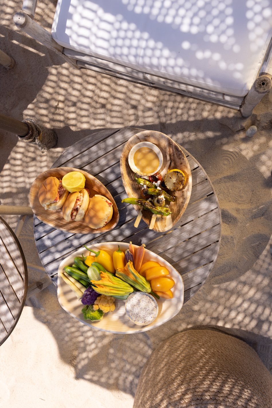 Vignette of several appetizers placed on a table at the Beach Club at Duryea's Orient Point