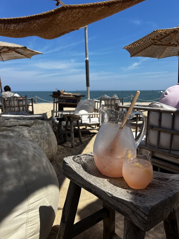 Blue skies and a platter of oysters on the half shell and a bottle of Duryea's Rose on ice