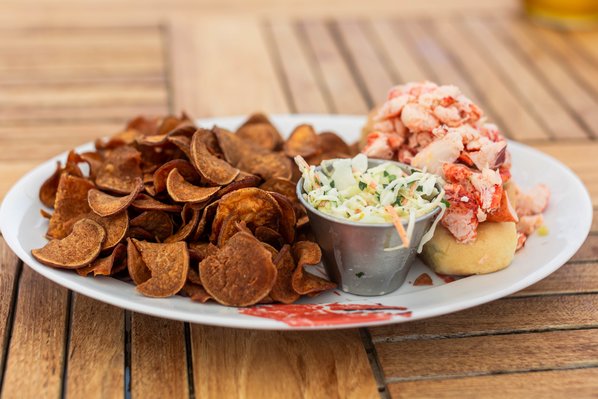Duryea's Famous lobster roll with sweet potato chips and coleslaw.