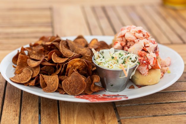 Duryea's famous lobster roll with sweet potato chips and coleslaw.