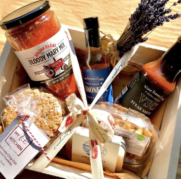 Assortment of sauces and dry goods in a box from Duryea's Market