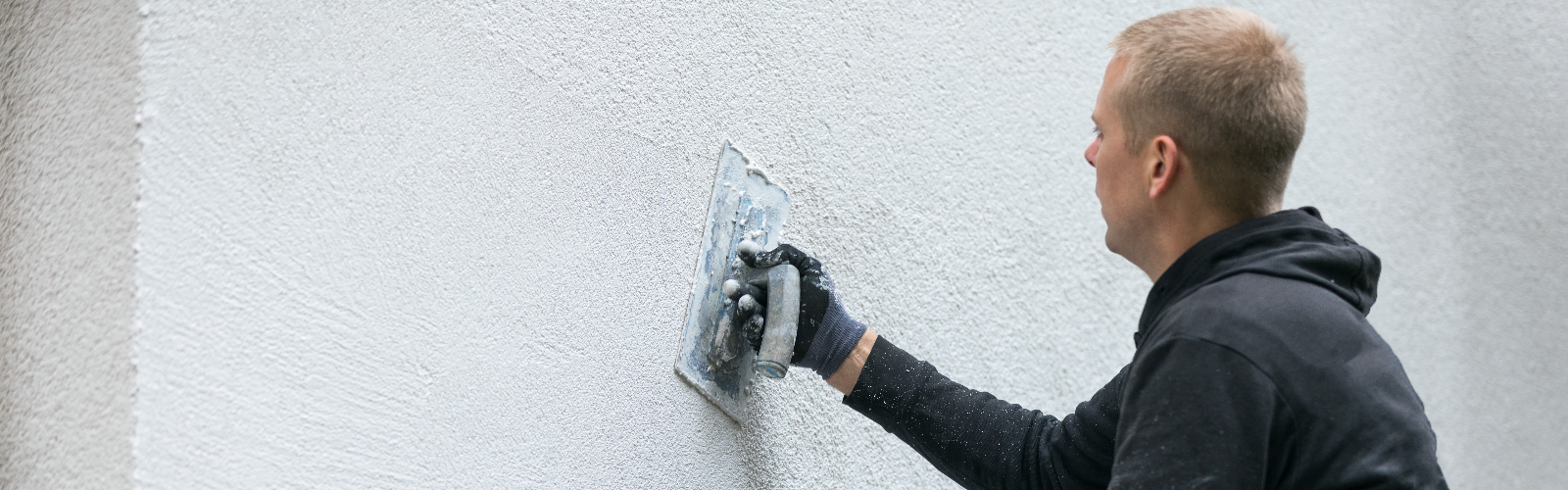 Man applying molding