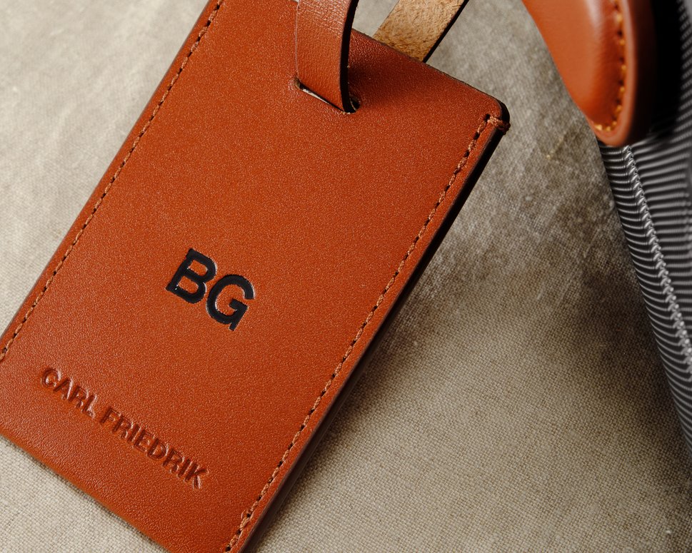 Customised brown leather luggage tag with personalisation